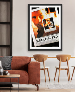 An original movie poster for the Christopher Nolan film Momento