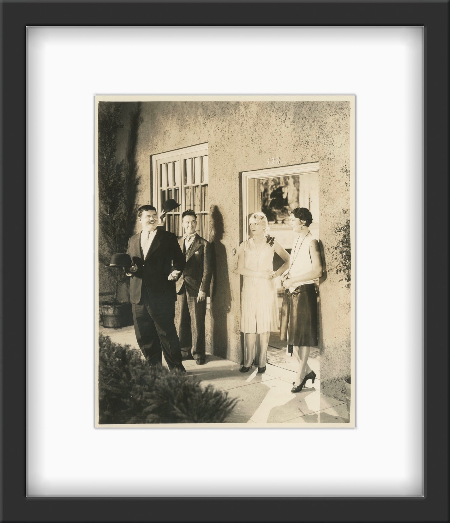 An original theatrical still from the Laurel and Hardy film We Faw Down
