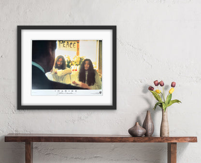 An original 11x14 lobby card for the John Lennon film Imagine