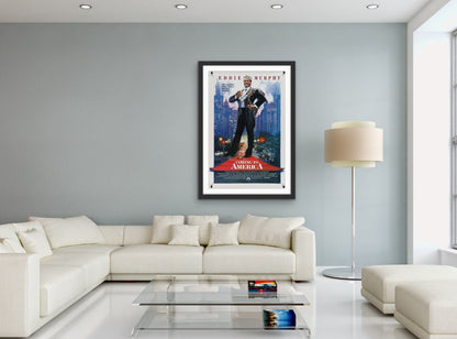 An original movie poster for the Eddie Murphy film Coming To America with artwork by Drew Struzan