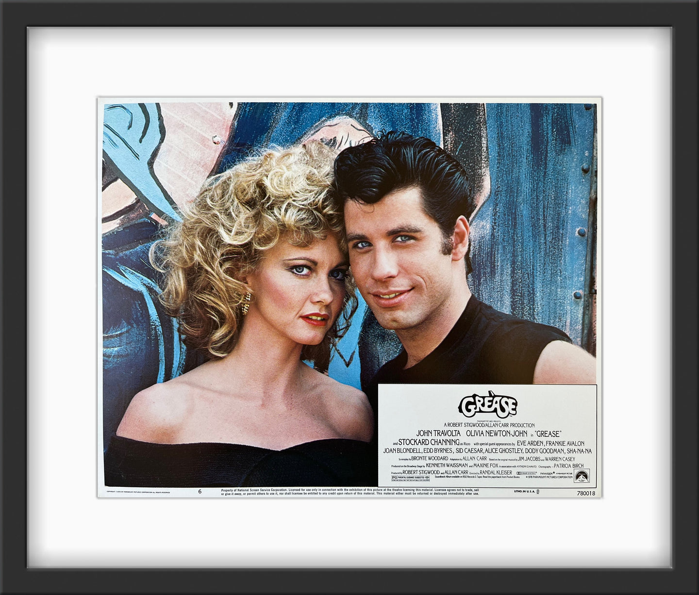 An original U.S. lobby card for the musical film Grease