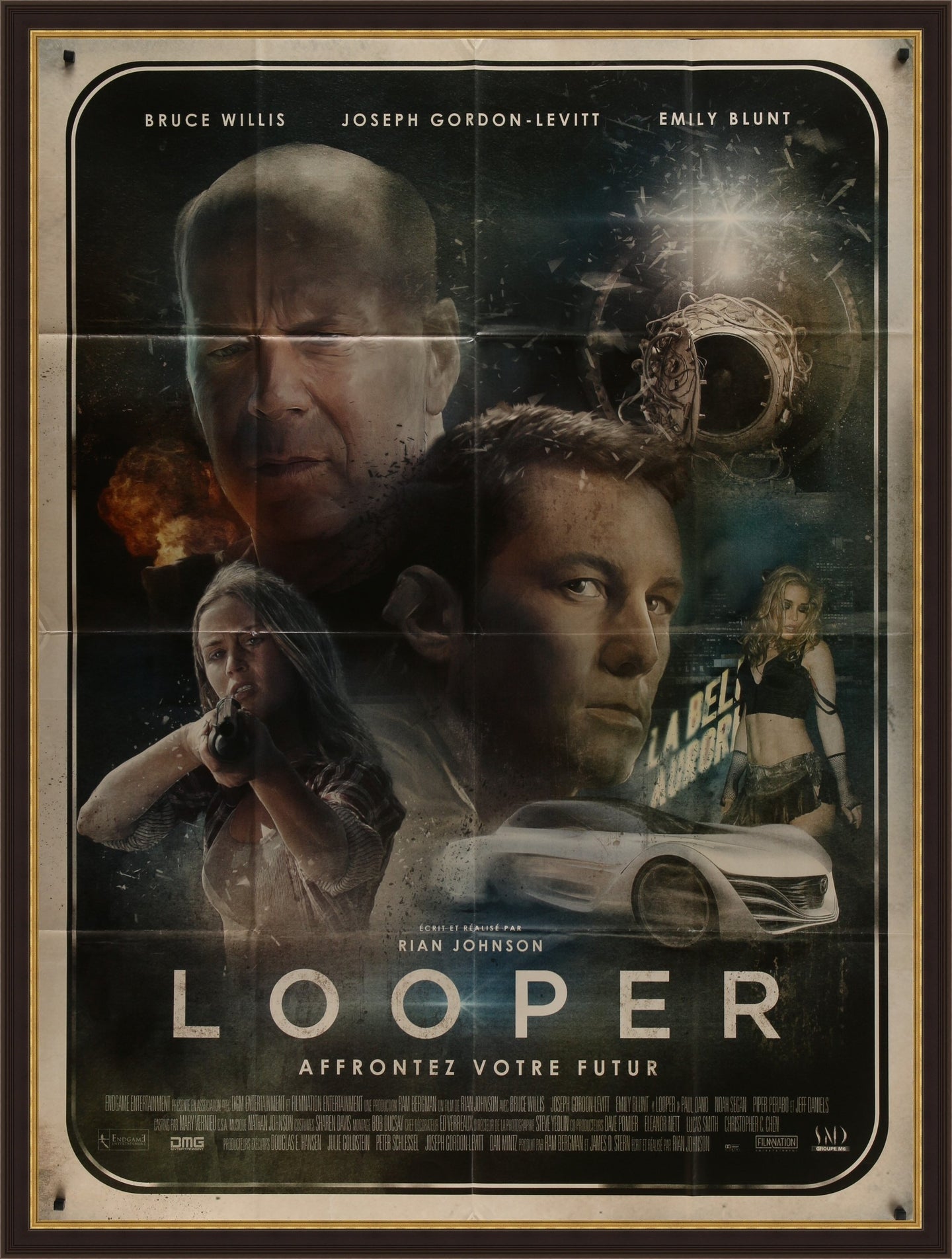 An original movie poster for the film Looper by Richard Davies