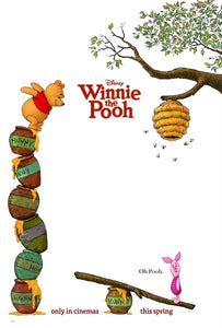 An original movie poster for the Disney film Winnie The Pooh